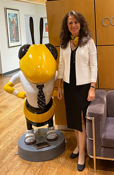Pinar Keskinocak standing with Buzz