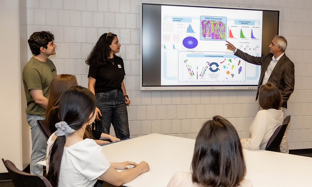 Professor Paynabar teaching students