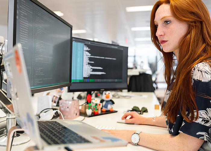 a woman working at a computer