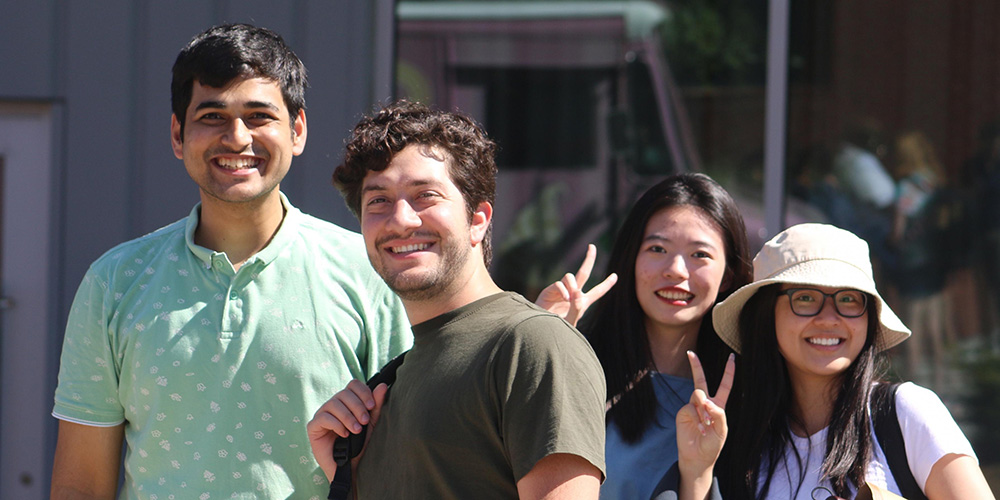 Happy students smiling for a picture