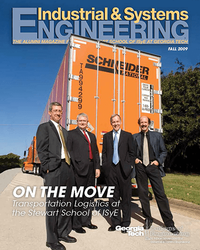 2009 ISyE magazine cover - four men standing together behind a semi truck