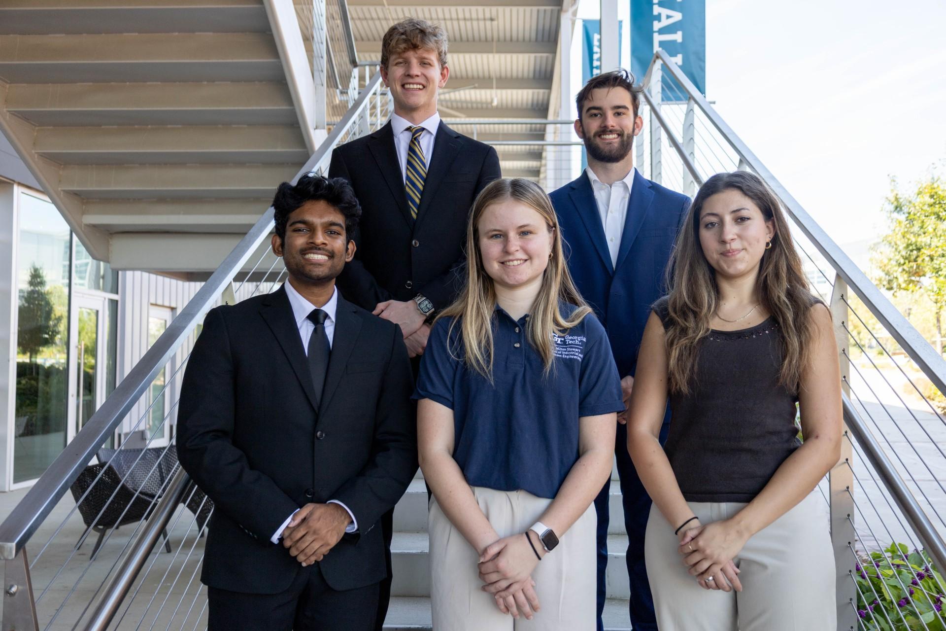 2025 USAC committee members standing on the stairs