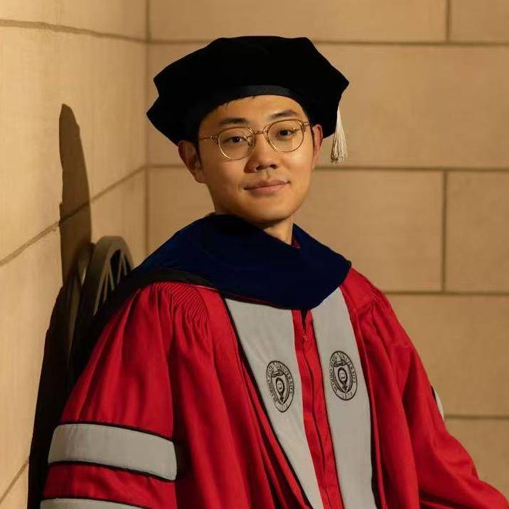 Yongzheng Dai in a doctoral gown