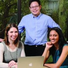 Dima Nazzal, ISyE director of student services, works with undergraduate students Misha Desai and Ethan Smith as they continue the research they began in their freshman year through the new Grand Challenges program at Georgia Tech.